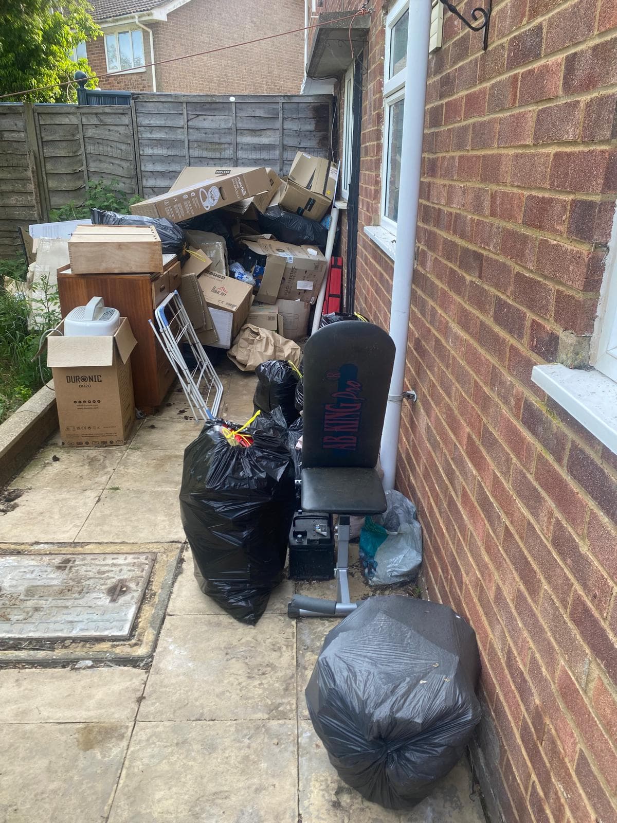 End of tenancy clearance — old bathroom suite and waste removed from a property