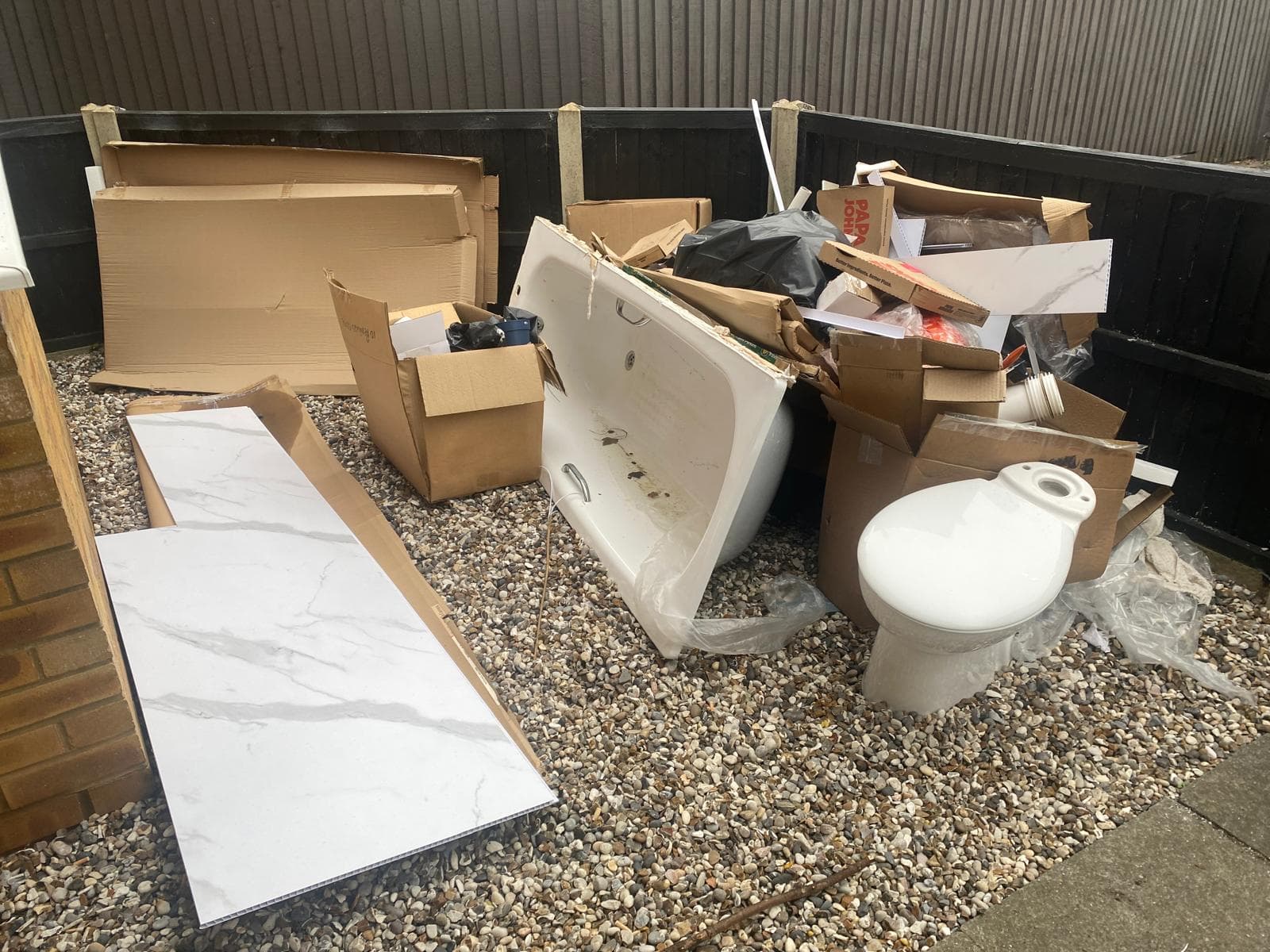 Old bathroom suite and tiles ready for removal