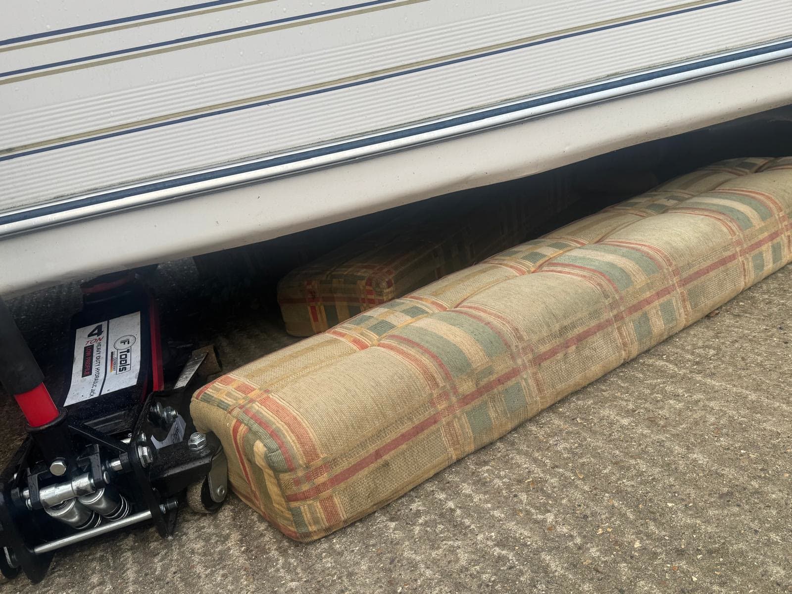 Caravan seat cushions stacked ready for collection