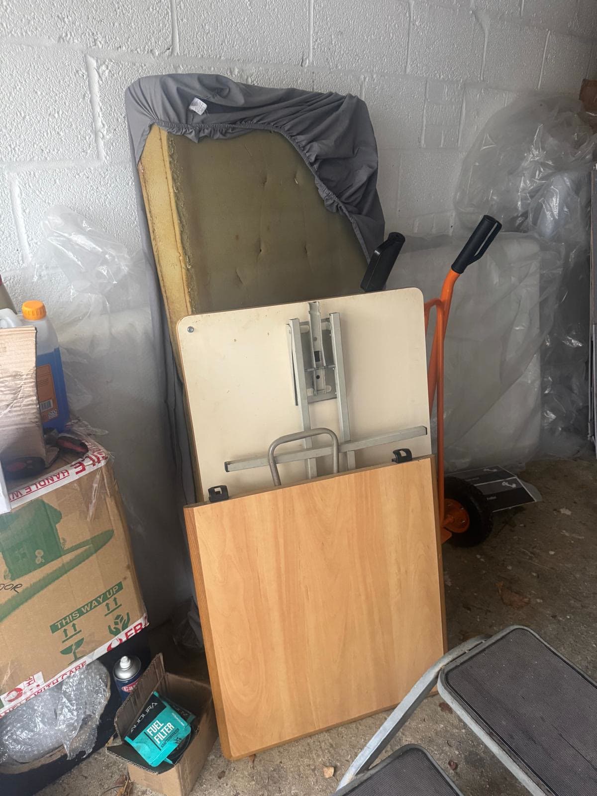 Mattress, table and furniture cleared from a caravan