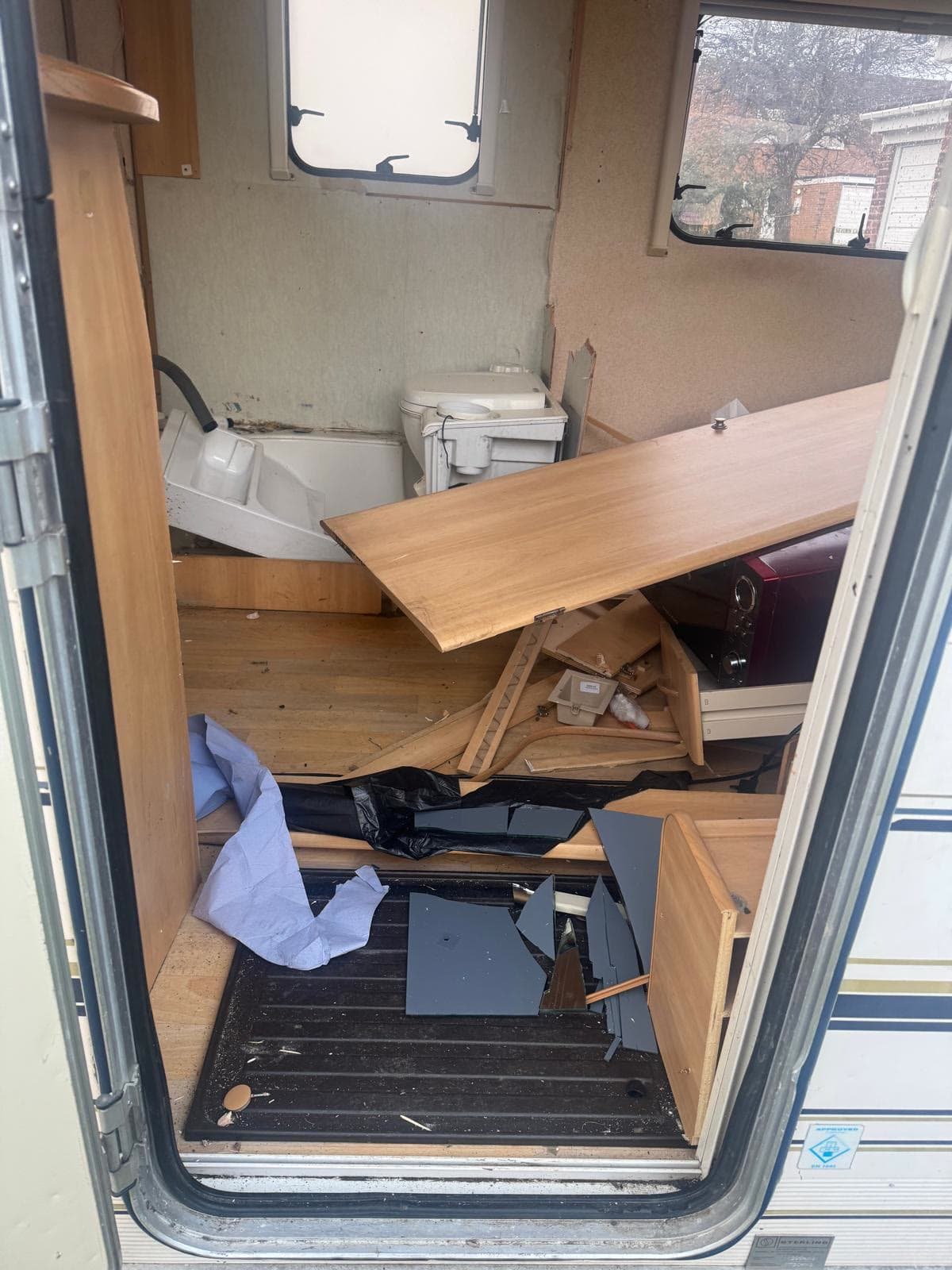 Interior of a caravan fully stripped out and cleared during a caravan clearance