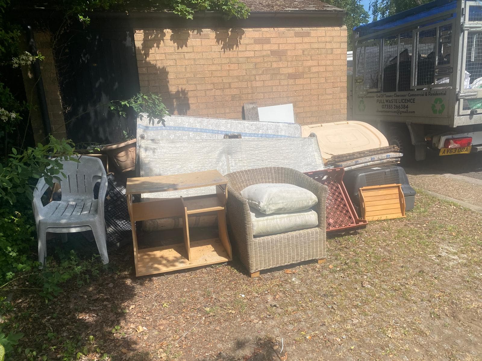 Furniture and mattress collection ready for our van during a house clearance