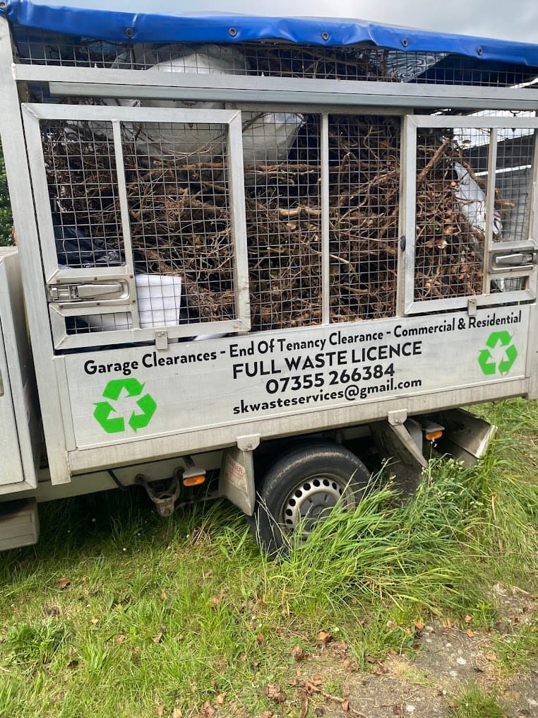 Van loaded with garden branches