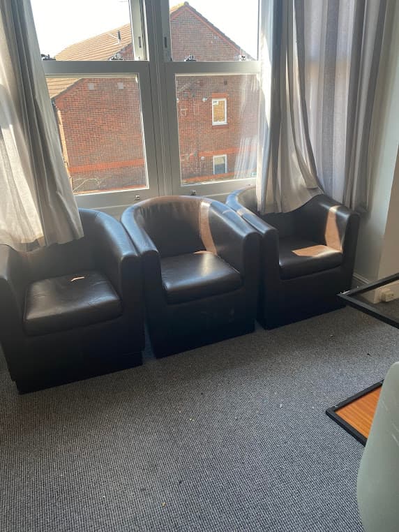 Old armchairs ready for removal