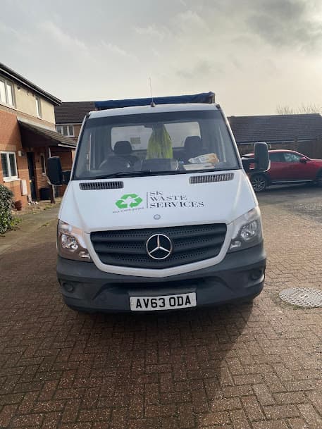 SK Waste Services van parked, ready for next job