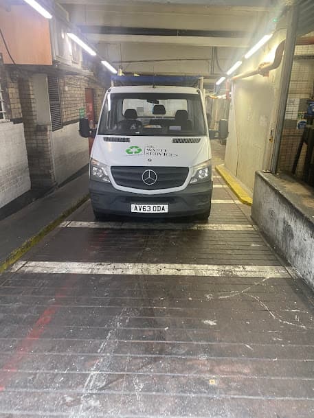 Van loading up in a multi-storey car park